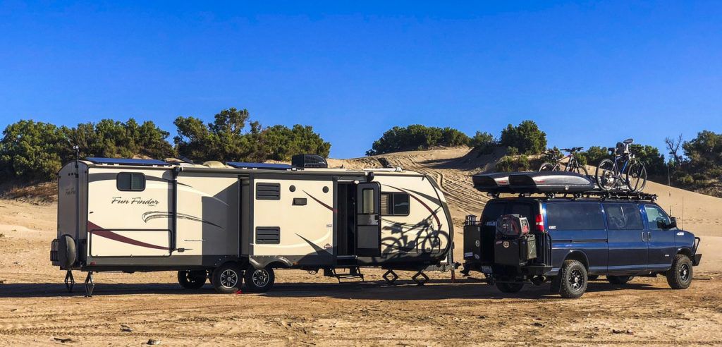 Full Size Conversion Van and Large Tow Behind RV with Solar, Bikes and Gear on   a Beach in Mexico
